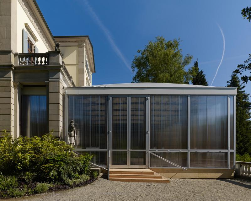 Summer Pavilion Zurich by Shigeru Ban entrance and closed window panels in polycarbonate