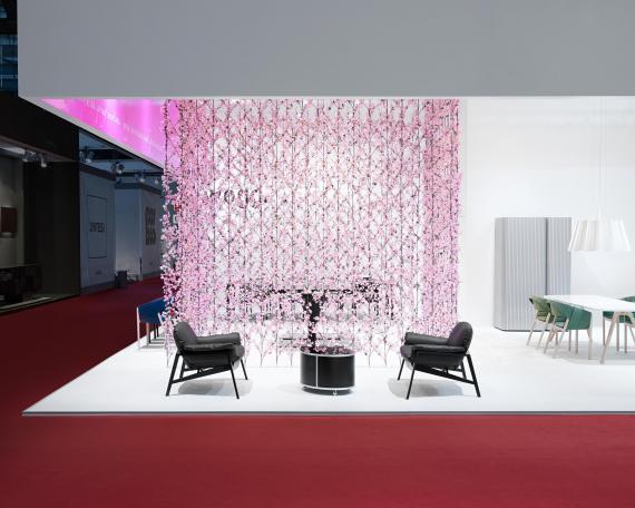 Furniture Fair Milan 2009 exhibition design for Wogg with a cherry blossom curtain in the center of the booth, exhibited furniture from the Amor, Rica and Roya collection 