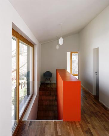 House Niederurnen view from the home office to the staircase and coloured sideboard 