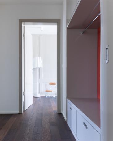 Townhouse Aarau view from hallway to the master bedroom with decorative panelling