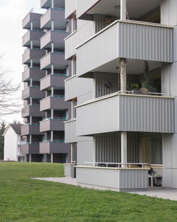 Conversion of apartment buildings on Baumgarten in Tann Detail of cubic balconies projecting from the façade