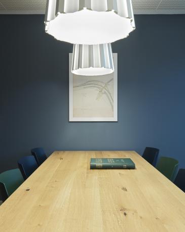 Linthverwaltung Benken_6_Ashida conference table with Houdini chairs by e15 and Sidar Schätti lights by Jörg Boner above, wall in Juniper Ash with the Salvetti map of Grynau