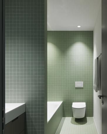 Children’s bathroom with porcelain stoneware tiles in pistachio by Winckelmans