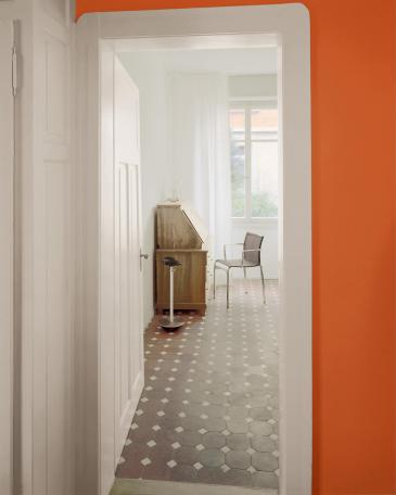 Apartment Zurich view to the master bedroom with old porcelain stoneware plates on the floor